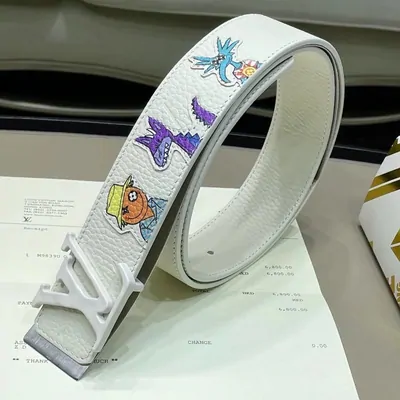 White belt printed with cartoon figures and a letter buckle