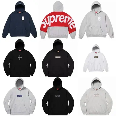 Hoodies in cream, navy and red laid out in rows