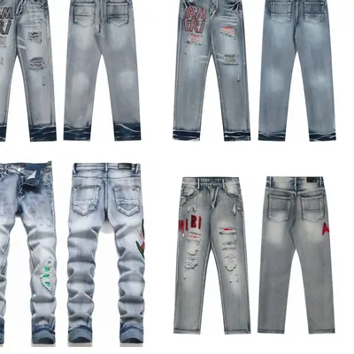 Jeans in light and dark washes with distressed details, laid out in rows