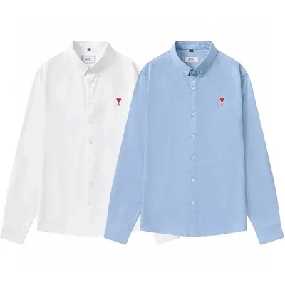 White and blue button shirts with a small embroidered chest motif