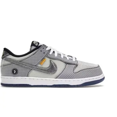Grey low-top sneaker, a stray card listed under watches